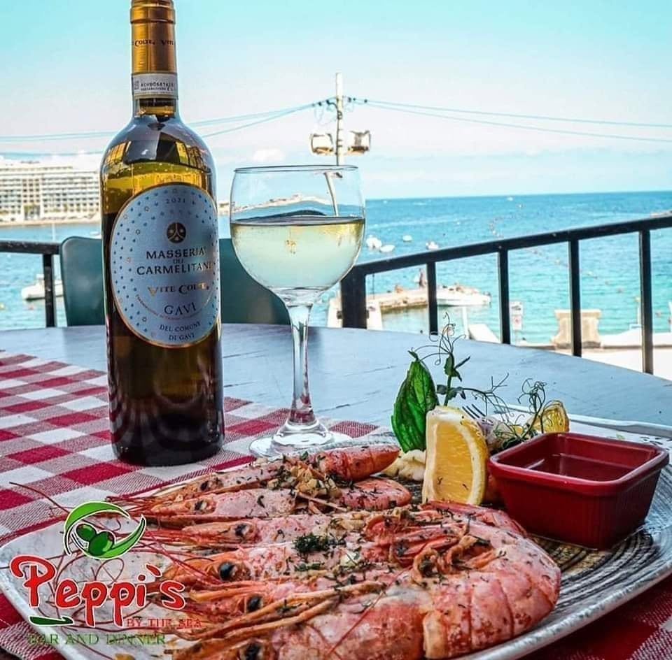 Prawns, wine, and a sea view